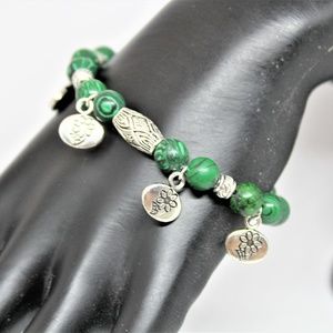Malachite beaded bracelet with silver charms